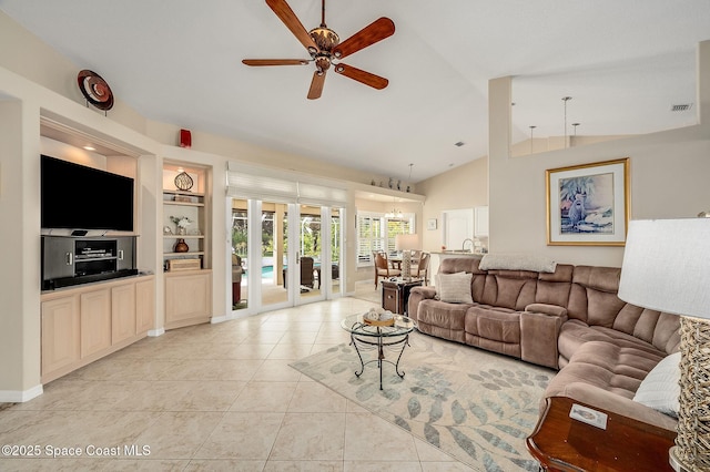208 Chello Ave, Sebastian, FL 32958 - living area featuring a ceiling fan, built in features, light tile patterned flooring, and high vaulted ceiling