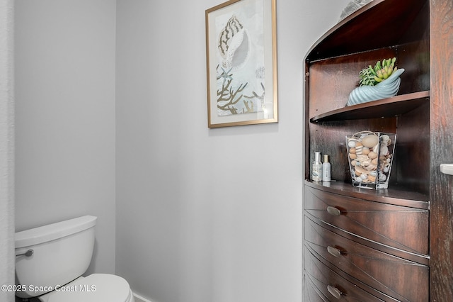 208 Chello Ave, Sebastian, FL 32958 - bathroom featuring toilet and baseboards