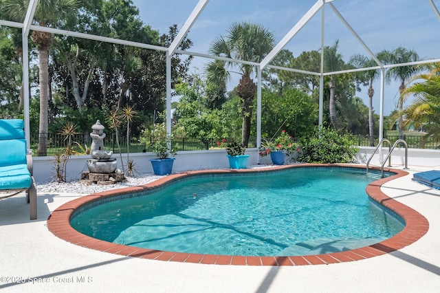 208 Chello Ave, Sebastian, FL 32958 - outdoor pool featuring a patio area and a lanai