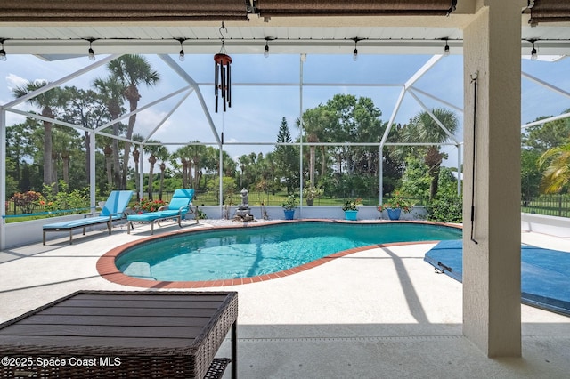 208 Chello Ave, Sebastian, FL 32958 - outdoor pool with a patio area and glass enclosure