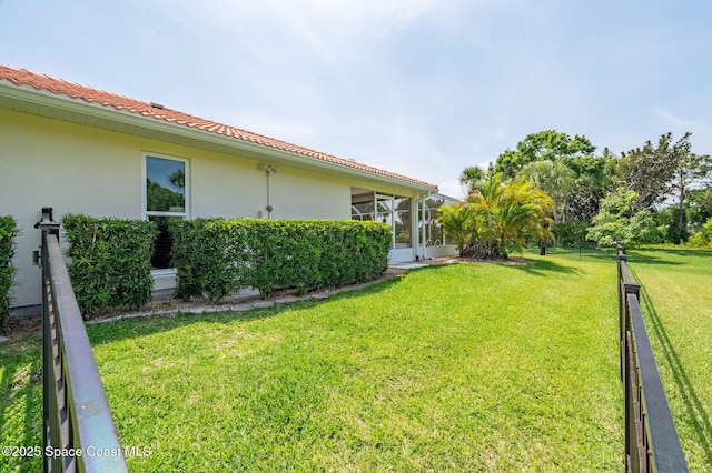 208 Chello Ave, Sebastian, FL 32958 - view of green lawn featuring a sunroom