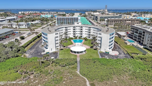 4000 Ocean Beach Blvd Unit 1J, Cocoa Beach, FL 32931 - drone / aerial view of a large body of water and a pool area