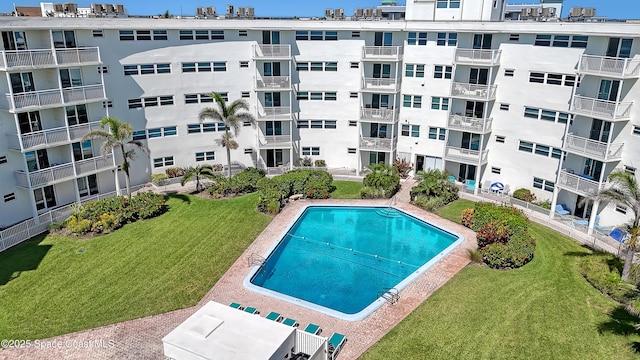 4000 Ocean Beach Blvd Unit 1J, Cocoa Beach, FL 32931 - community pool with a lawn