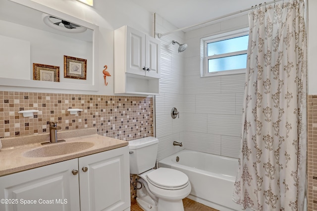 4000 Ocean Beach Blvd Unit 1J, Cocoa Beach, FL 32931 - full bathroom with toilet, shower / tub combo, vanity, and tasteful backsplash