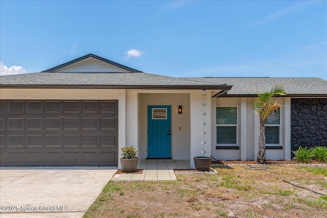 1020 Sycamore Dr, Rockledge, FL 32955 - ranch-style house with a garage, stucco siding, driveway, and roof with shingles