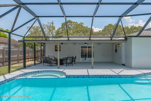 1020 Sycamore Dr, Rockledge, FL 32955 - view of pool featuring ceiling fan, a patio, a lanai, and a pool with connected hot tub