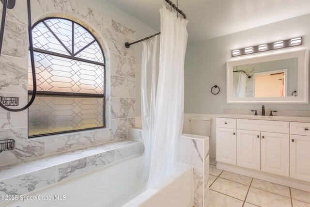 1770 Monrovia St NW, Palm Bay, FL 32907 - bathroom featuring shower / bath combo and vanity