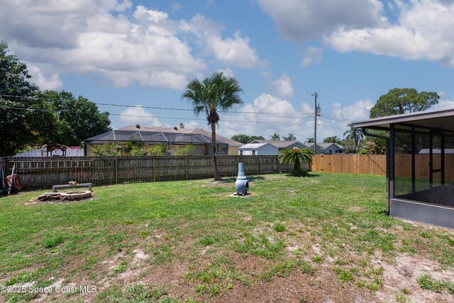 1770 Monrovia St NW, Palm Bay, FL 32907 - view of yard with a sunroom
