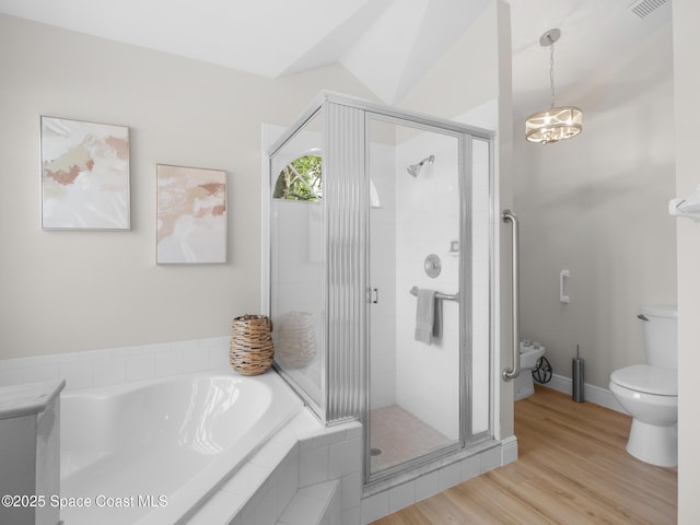 1750 Old Glory Blvd, Melbourne, FL 32940 - bathroom with toilet, a bath, wood finished floors, and a shower stall