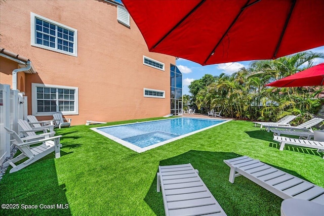 120 Mediterranean Way, Indian Harbour Beach, FL 32937 - swimming pool featuring a yard