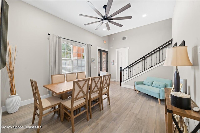 120 Mediterranean Way, Indian Harbour Beach, FL 32937 - dining area with stairs, a ceiling fan, light wood finished floors, and recessed lighting