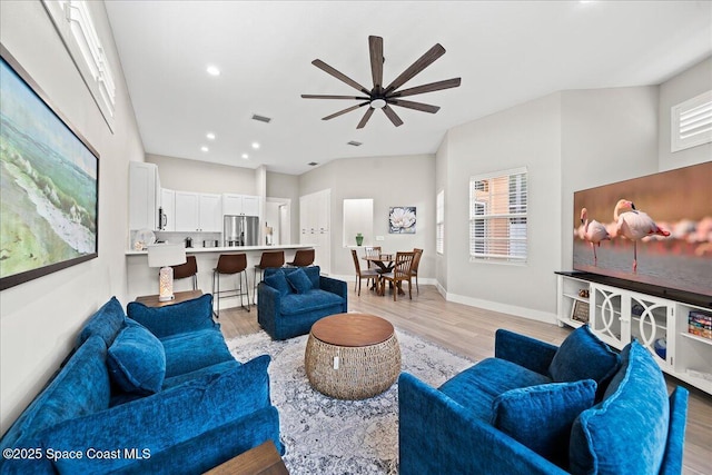 120 Mediterranean Way, Indian Harbour Beach, FL 32937 - living area featuring light wood finished floors, a ceiling fan, and recessed lighting