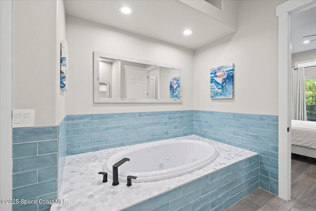 120 Mediterranean Way, Indian Harbour Beach, FL 32937 - bathroom featuring a jetted tub, connected bathroom, and recessed lighting
