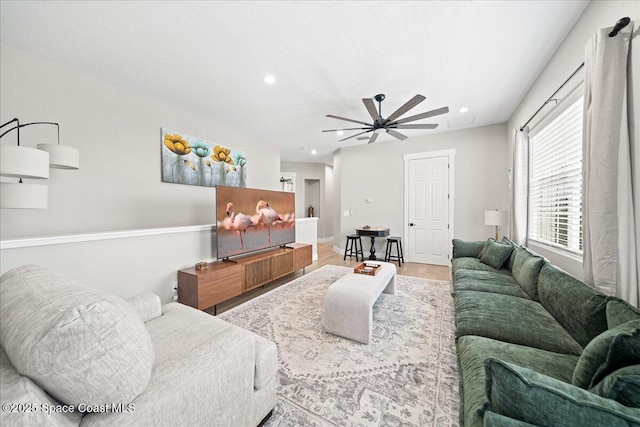 120 Mediterranean Way, Indian Harbour Beach, FL 32937 - living room featuring a ceiling fan, recessed lighting, and wood finished floors