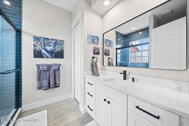 120 Mediterranean Way, Indian Harbour Beach, FL 32937 - full bath with a shower stall, vanity, wood finished floors, and recessed lighting