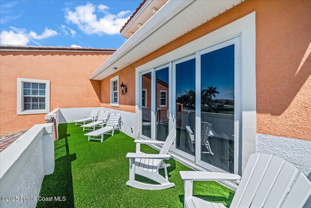 120 Mediterranean Way, Indian Harbour Beach, FL 32937 - view of grassy yard