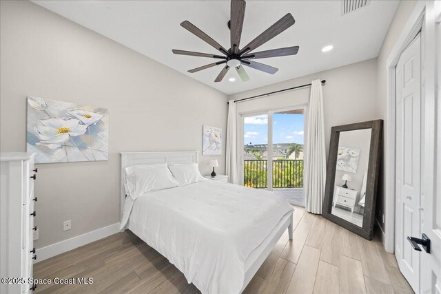 120 Mediterranean Way, Indian Harbour Beach, FL 32937 - bedroom featuring access to exterior, light wood-type flooring, recessed lighting, and ceiling fan