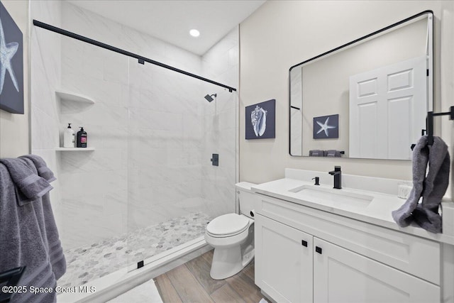 120 Mediterranean Way, Indian Harbour Beach, FL 32937 - full bath with vanity, a tile shower, and wood finished floors