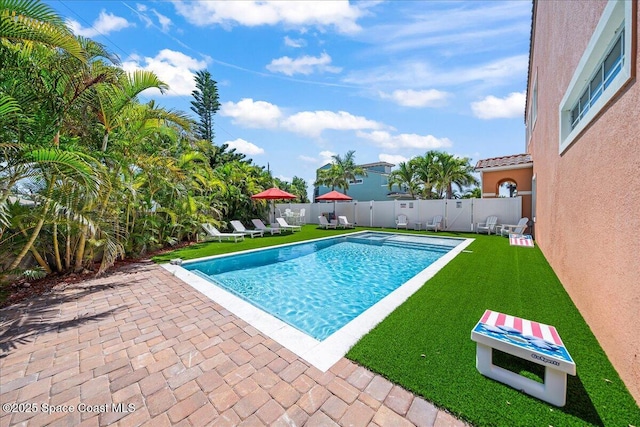 120 Mediterranean Way, Indian Harbour Beach, FL 32937 - view of swimming pool with a fenced backyard and a patio