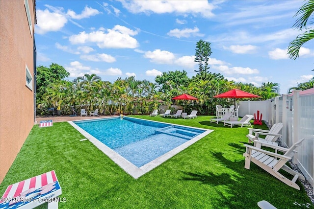 120 Mediterranean Way, Indian Harbour Beach, FL 32937 - view of pool featuring a pool with connected hot tub, a fenced backyard, and a patio