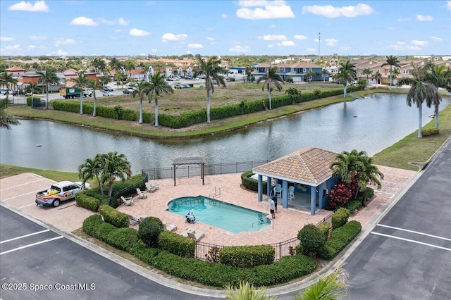 120 Mediterranean Way, Indian Harbour Beach, FL 32937 - aerial perspective of suburban area featuring a large body of water and a pool area
