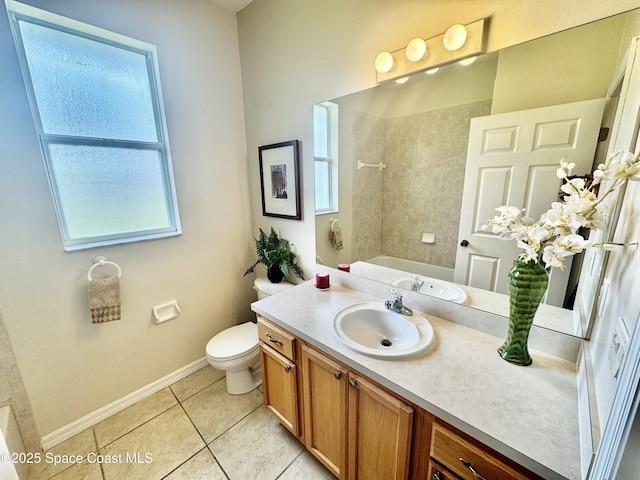 2601 Diane Ave SE, Palm Bay, FL 32909 - bathroom with vanity, toilet, tile patterned flooring, baseboards, and shower / bath combination