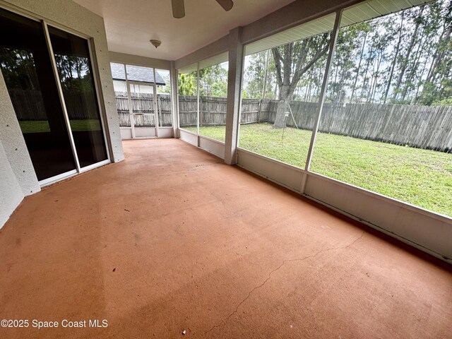 2601 Diane Ave SE, Palm Bay, FL 32909 - unfurnished sunroom featuring a ceiling fan