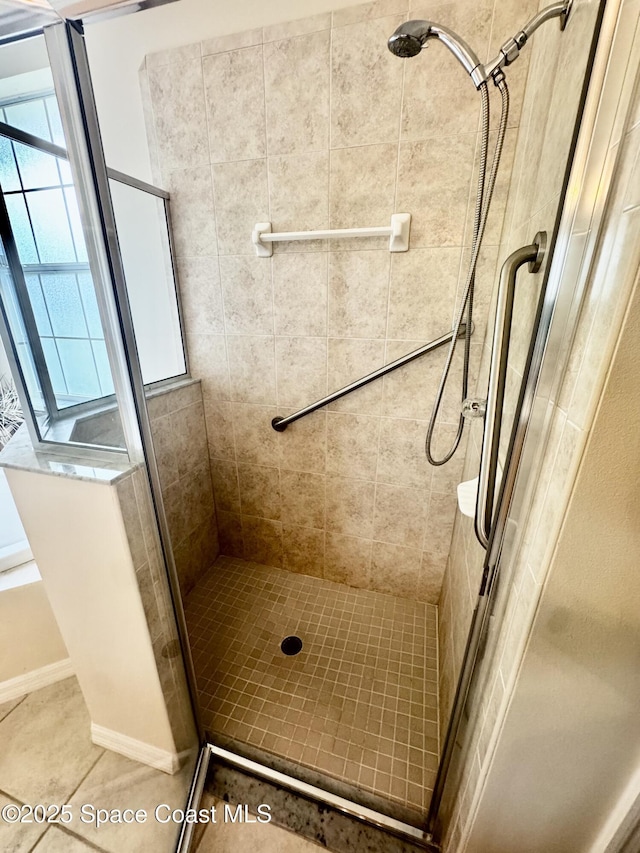 2601 Diane Ave SE, Palm Bay, FL 32909 - full bath with a shower stall and tile patterned floors