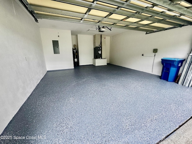 2601 Diane Ave SE, Palm Bay, FL 32909 - garage with electric panel, a garage door opener, heating unit, and water heater