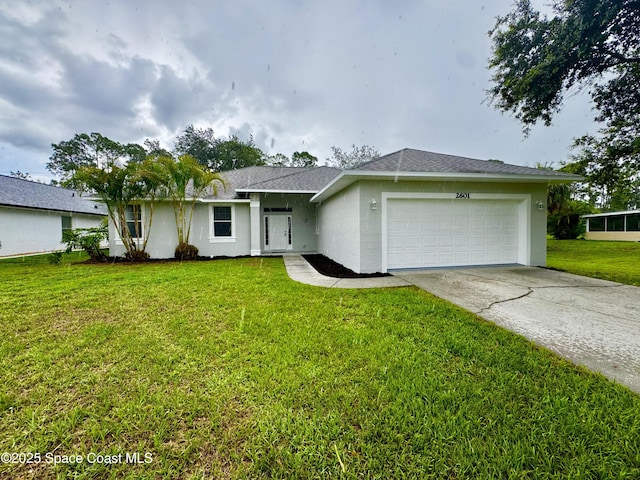 2601 Diane Ave SE, Palm Bay, FL 32909 - single story home featuring a garage, stucco siding, concrete driveway, and a front yard