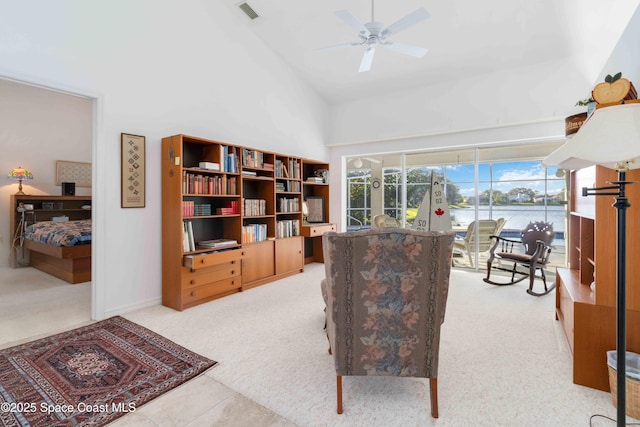 1181 Cypress Trace Dr, Melbourne, FL 32940 - living area featuring high vaulted ceiling, carpet, and a ceiling fan