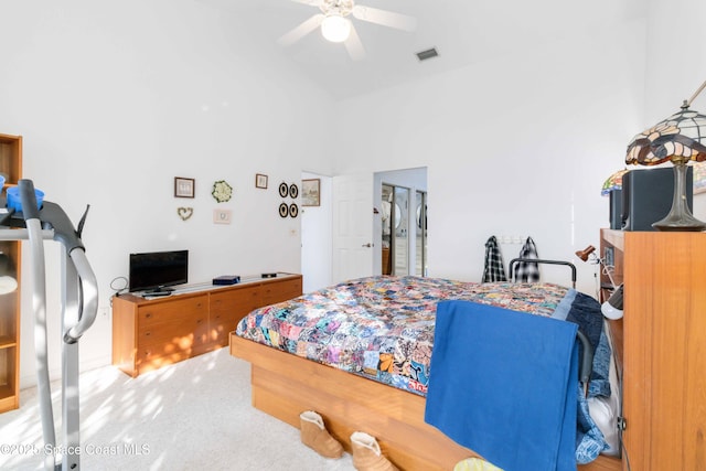 1181 Cypress Trace Dr, Melbourne, FL 32940 - carpeted bedroom with vaulted ceiling and ceiling fan