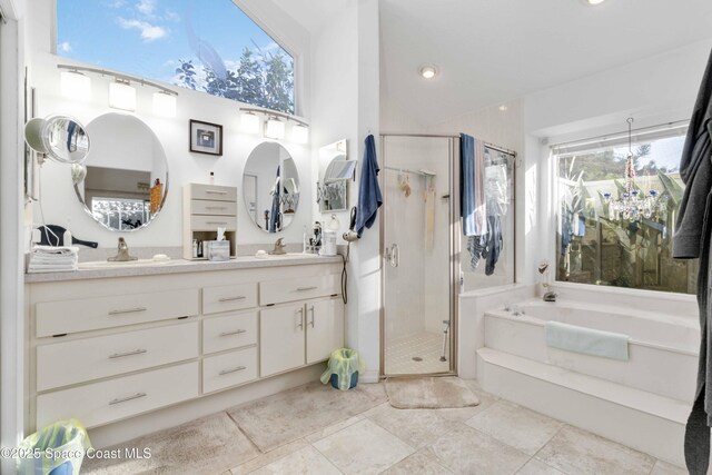 1181 Cypress Trace Dr, Melbourne, FL 32940 - full bathroom with a garden tub, a shower stall, vanity, and tile patterned flooring