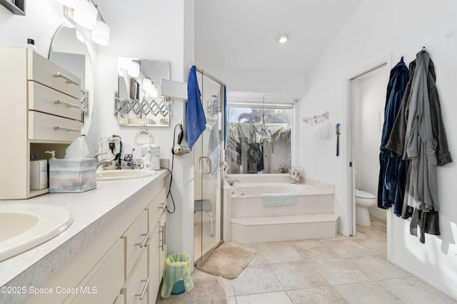 1181 Cypress Trace Dr, Melbourne, FL 32940 - bathroom featuring a stall shower, a bath, double vanity, toilet, and recessed lighting