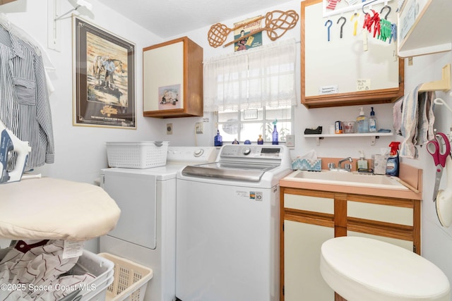 1181 Cypress Trace Dr, Melbourne, FL 32940 - washroom featuring washer and dryer and cabinet space