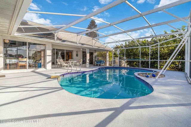 1181 Cypress Trace Dr, Melbourne, FL 32940 - swimming pool with a patio and glass enclosure