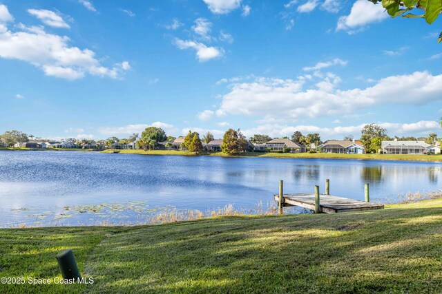 1181 Cypress Trace Dr, Melbourne, FL 32940 - water view featuring a dock and nearby suburban area