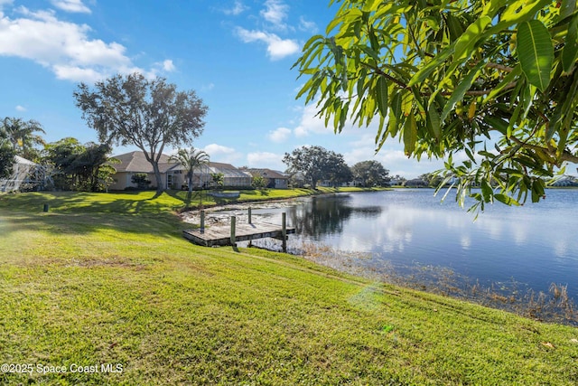 1181 Cypress Trace Dr, Melbourne, FL 32940 - dock area featuring a water view and a lawn