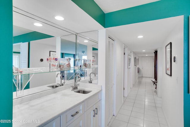 1527 S Atlantic Ave Unit 201, Cocoa Beach, FL 32931 - indoor wet bar with light tile patterned flooring, baseboards, and recessed lighting