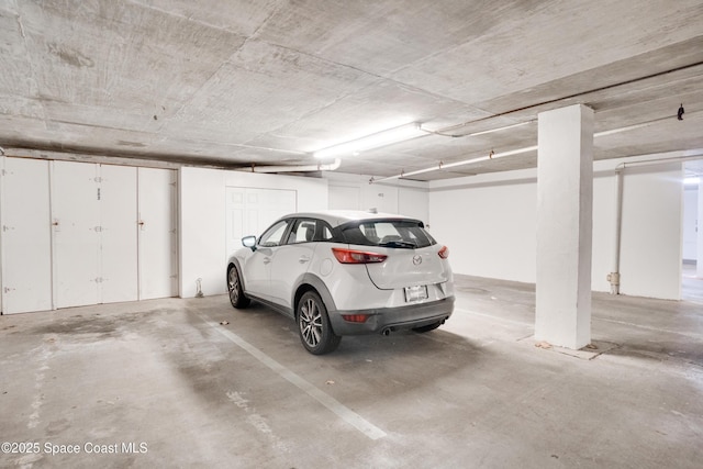 1527 S Atlantic Ave Unit 201, Cocoa Beach, FL 32931 - view of parking garage