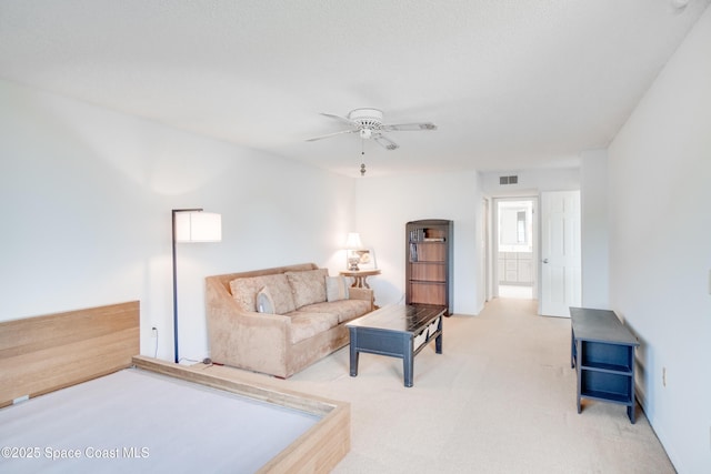 1527 S Atlantic Ave Unit 201, Cocoa Beach, FL 32931 - carpeted living area featuring ceiling fan