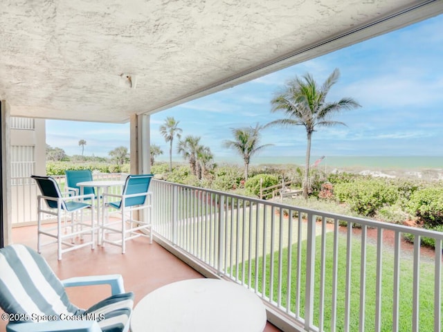 1527 S Atlantic Ave Unit 201, Cocoa Beach, FL 32931 - balcony featuring outdoor dining space