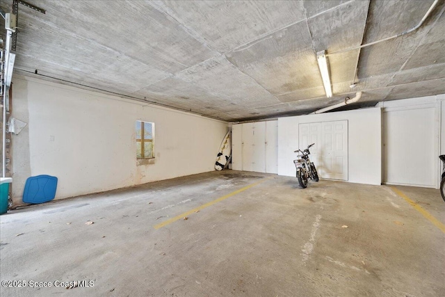 1527 S Atlantic Ave Unit 201, Cocoa Beach, FL 32931 - view of parking garage