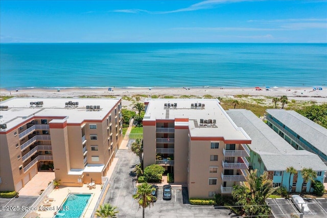 1527 S Atlantic Ave Unit 201, Cocoa Beach, FL 32931 - drone / aerial view of apartment complex and expansive coastline