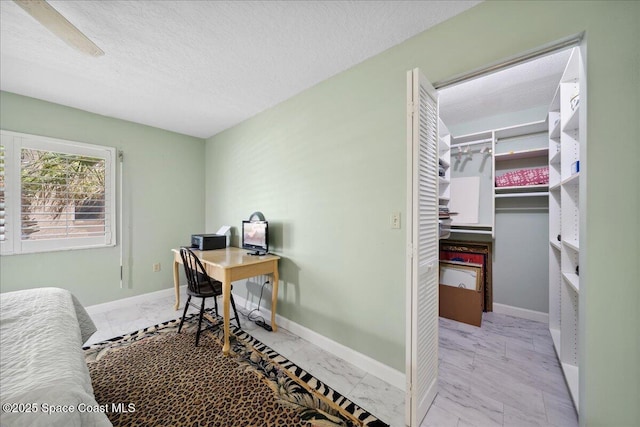 1527 S Atlantic Ave Unit 201, Cocoa Beach, FL 32931 - office area featuring marble look tile flooring and a textured ceiling