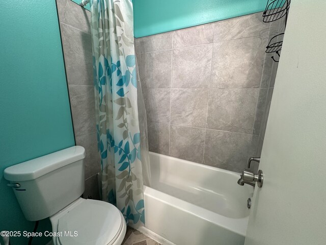 1021 Abada Ct NE Unit 106, Palm Bay, FL 32905 - full bath with shower / bath combo with shower curtain and toilet