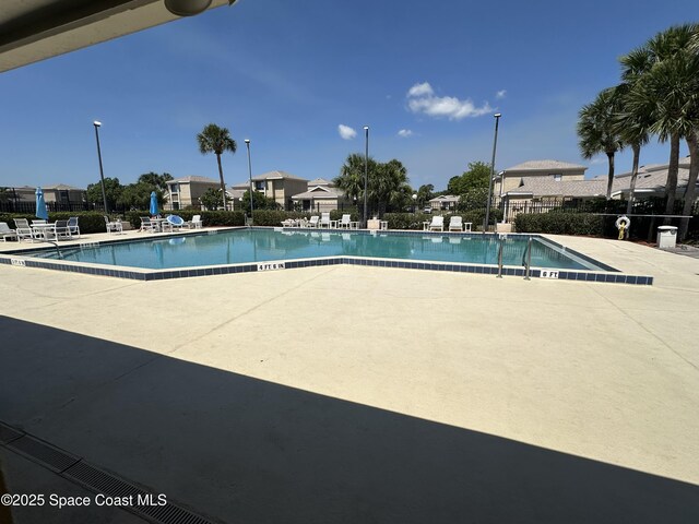 1021 Abada Ct NE Unit 106, Palm Bay, FL 32905 - community pool with a patio