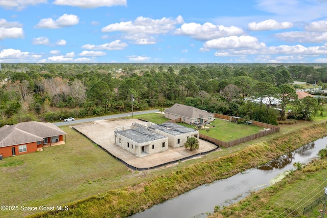 28262830 Hester Ave SE, Palm Bay, FL 32909 - aerial view of property and surrounding area featuring a forest and a large body of water