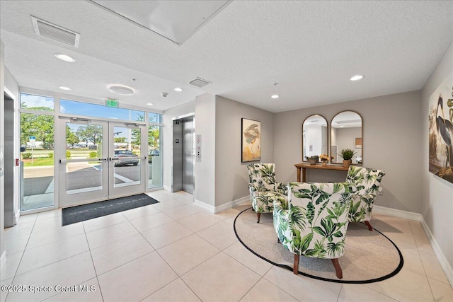 1825 Riverside Dr Unit 205, Titusville, FL 32780 - building lobby with a textured ceiling and recessed lighting