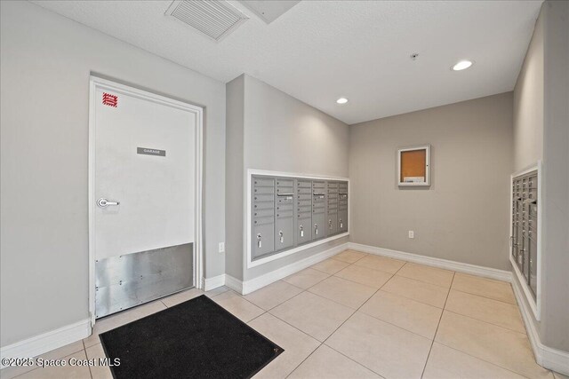 1825 Riverside Dr Unit 205, Titusville, FL 32780 - view of home's community featuring mail area and recessed lighting